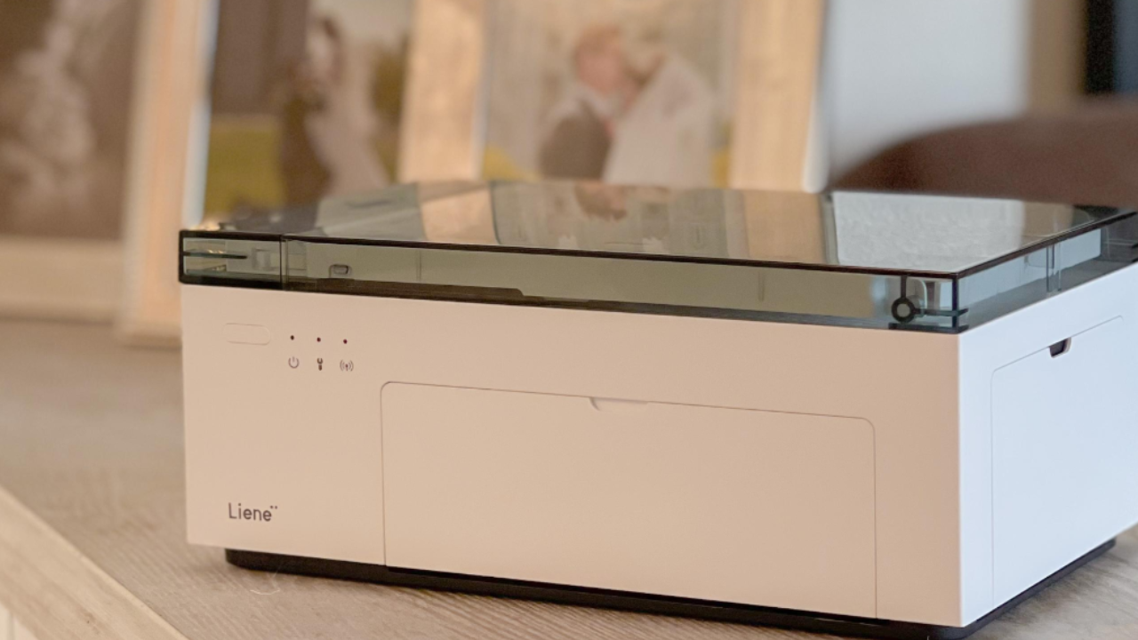 Which Liene Photo Printer features make it ideal for a traveling companion?