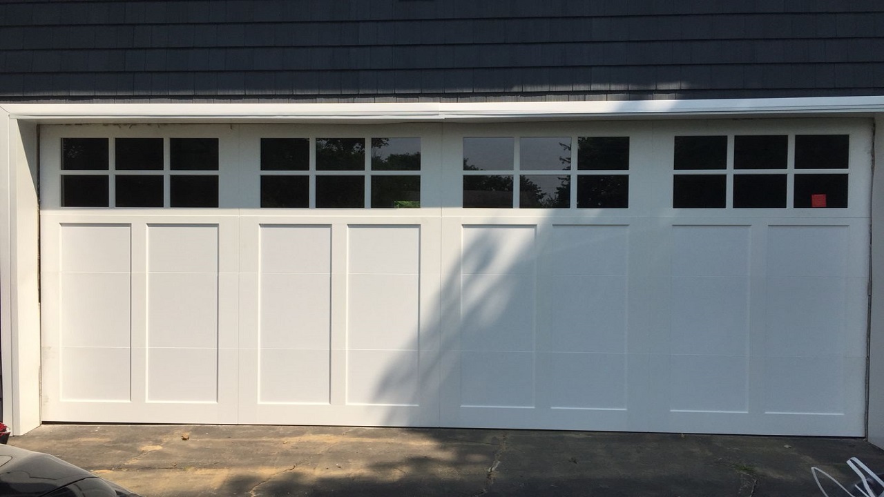 Enhancing Security: Key Features for Your 16×8 Garage Door